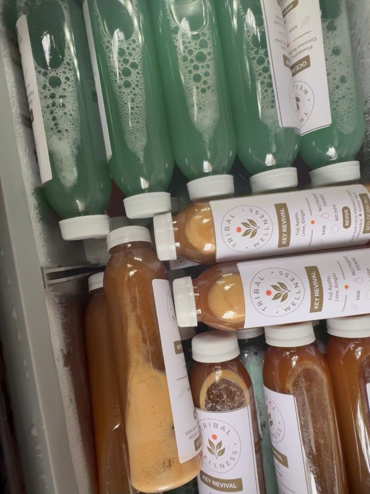 Fridge full of fresh Tribal Wellness cold pressed juices